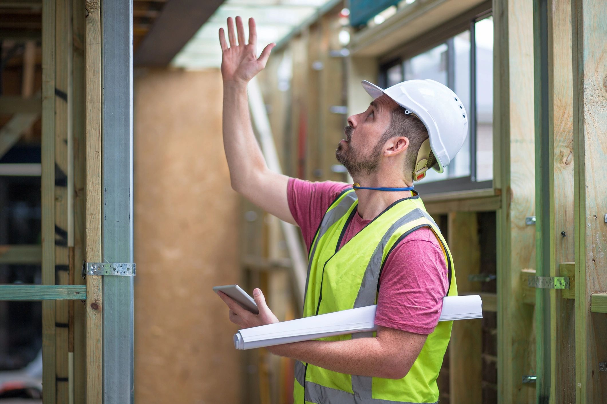 Construction professional checking work on a building site