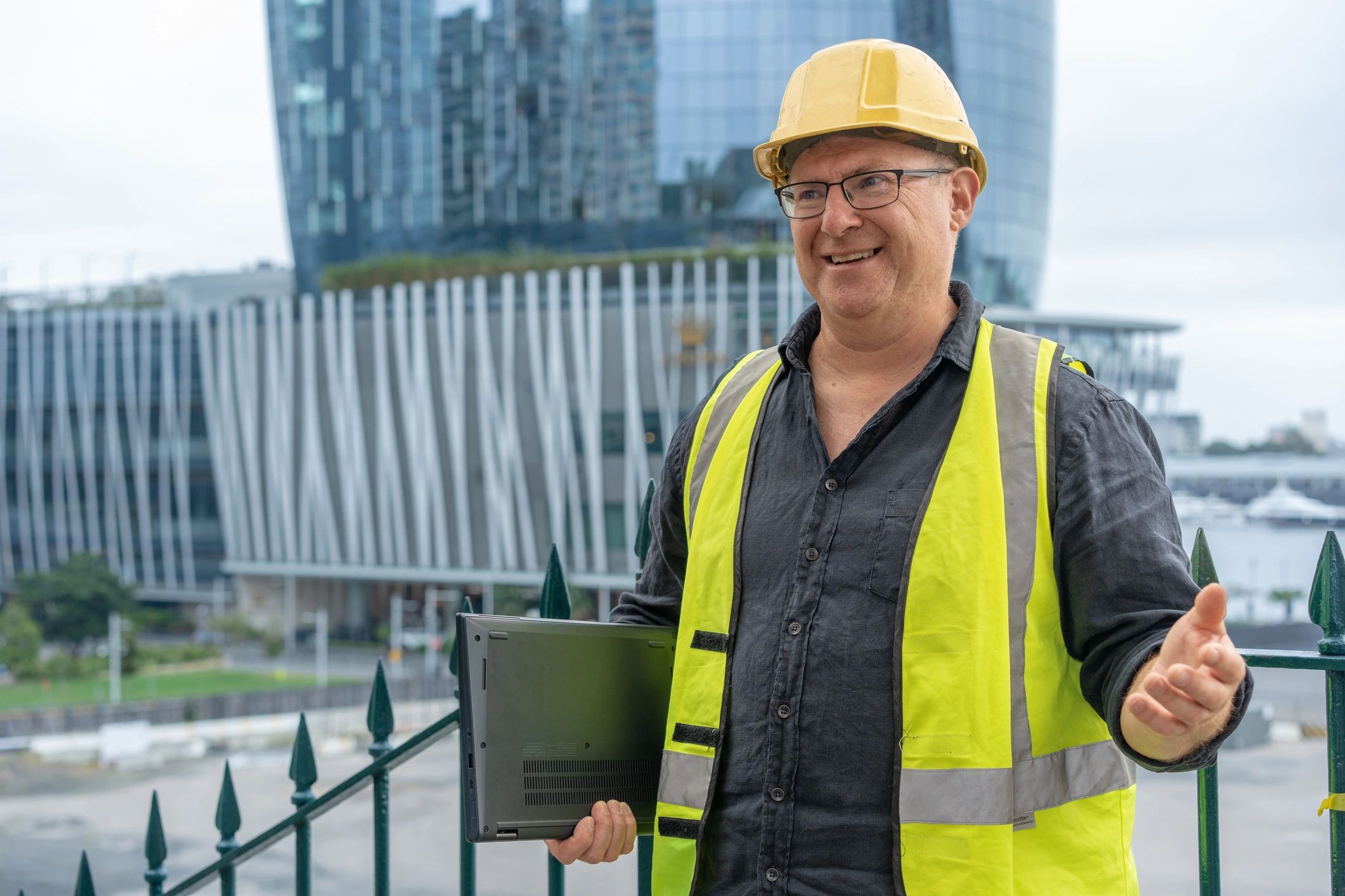 Building consultant on a construction site reviewing plans